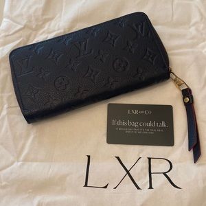 Vintage Bleu Infini Monogram Empreinte Leather Zippy Wallet